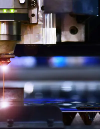 close-up-shot-cnc-laser-cut-machine-while-cutting-the-sheet-metal-with-the-sparking-light-the-hi-precision-sheet-cutting-process-by-laser-cut