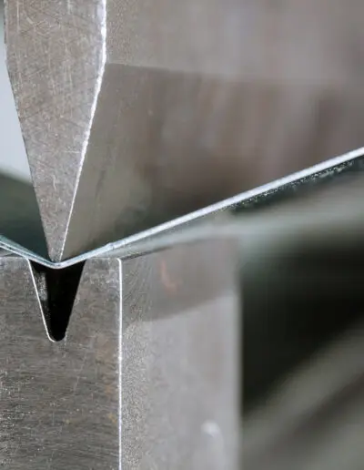 the-process-of-bending-sheet-metal-on-hydraulic-bending-machine-metalworking-plant (1)