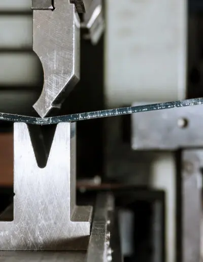 the-process-of-bending-sheet-metal-on-hydraulic-bending-machine-metalworking-plant